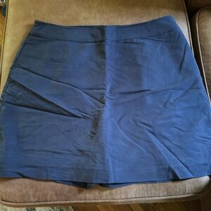 Navy blue golf skirt.